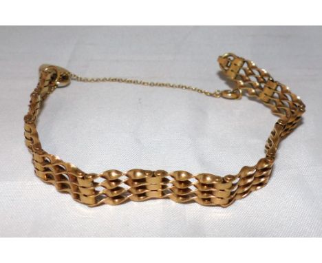 A 9 carat gold gate bracelet, 11.7gm