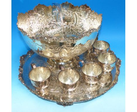 A silver plated embossed punch set with pedestal bowl, 12 cups, ladle and tray