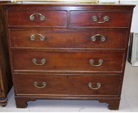A George III mahogany chest of 3 long and 2 short drawers with parcel gilt drop handles, on bracket feet, width 36"