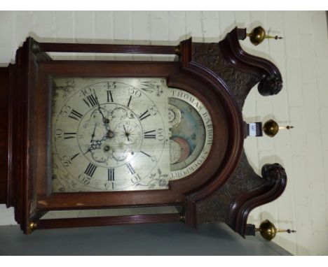 A late 18th century oak and mahogany longcase clock, the hood with rose carved paterae, blind fret frieze, turned and reeded 