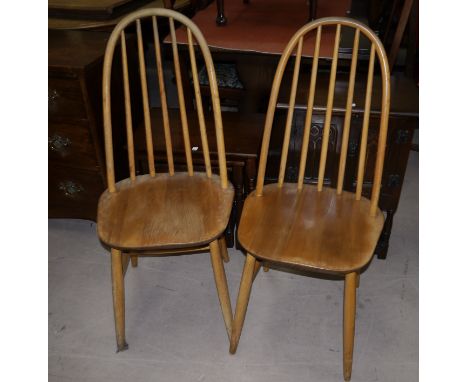 A pair of 1950's Ercol light elm hoop and stick back dining chairs