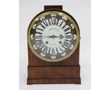 A continental mahogany cased table clock the cast brass dial with enamel numerals and central panel signed 'L Brulefer, A Par