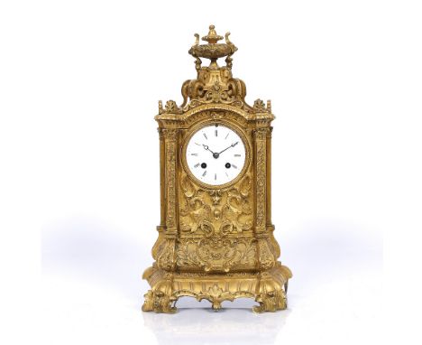 A 19th Century French ormolu mantel clock with white enamel Roman dial, the Raingo drum movement with outside count wheel bel