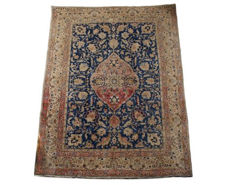 An Iranian blue ground carpet  with central foliate design and multiple border, 244cm x 351cm