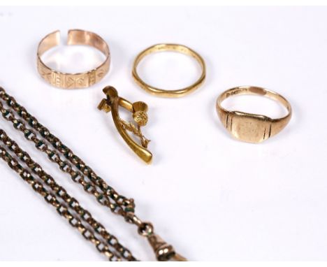 A guard chain with a small collection of 9ct gold rings, 6gms