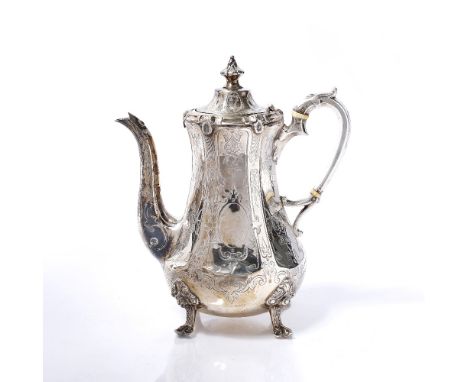 A Victorian silver teapot of tapering baluster form, with shaped spout and handle, engraved and chased decoration, London 185