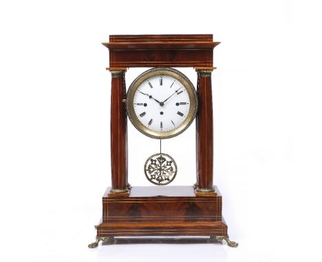 A 19th Century mahogany Portico clock with white enamel Roman dial, the grande sonnerie three train movement with coiled gong