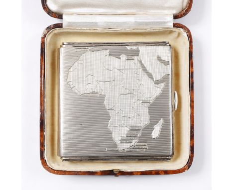 A silver cigarette case with engine turn decoration, engraved with a map of the continent of Africa, Birmingham 1938, 102g, i