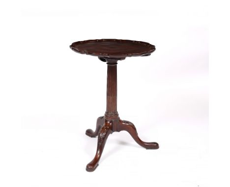 A George III mahogany tripod table in the manner of Thomas Chippendale, with fluted base, 51cm diameter