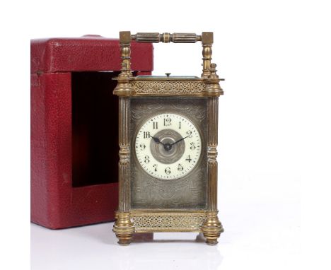 A late 19th Century French carriage clock with Gothic enamel chaptering with foliate engraved silvered mask, silvered platfor