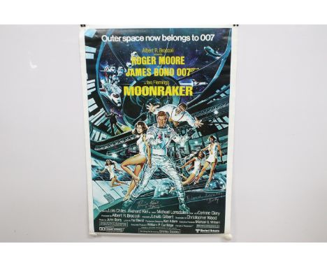 Signed James Bond 007 Moonraker reproduction poster, signed by Richard Kiel - "Jaws" &amp; Blanche Ravalec - "Dolly". vg