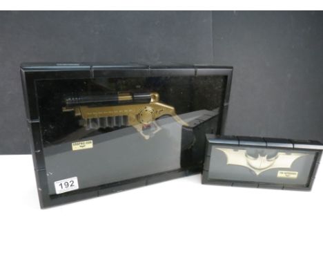 Two cased Batman The Dark Knight props featuring Grapnel Gun &amp; The Batarang, vg