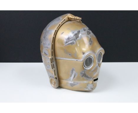 Star Wars - Full Size replica Star Wars C-3PO helmet, model with battery operated eyes and dent to top of head with some dist