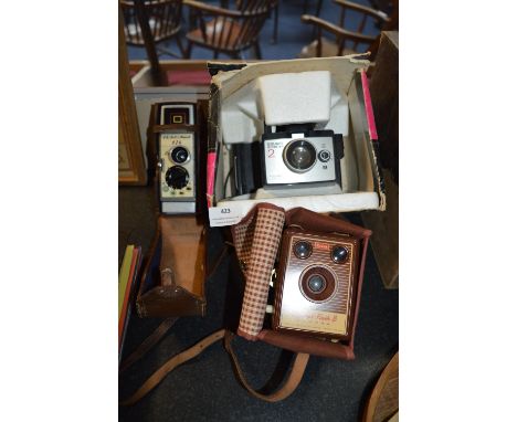 Polaroid Square Shooter 2 Land Camera, Brownie Flash B Box Camera and a Ben &amp; Howell 8mm Cine Camera