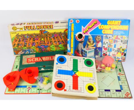 A mixed lot to include Scrabble by Spears Games, Full House by Parker, 2 x vintage Monopoly boards and other