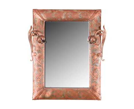 ENGLISH ARTS &amp; CRAFTS WALL MIRROR, CIRCA 1900 copper with pewter inlay, enclosing a mirrored plate and fitted with two el