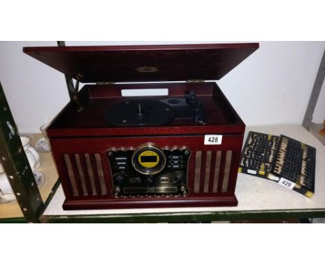 A 20th century record player / radio. COLLECT ONLY.