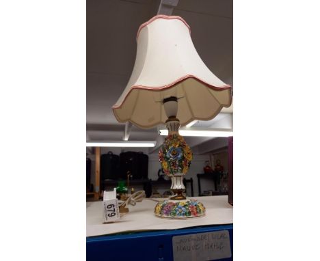A china table lamp with relief lustre flowers