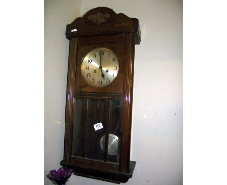 A 1930's oak wall clock - COLLECT ONLY 