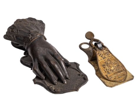 Two mid 19th Century brass paperclips: one cast 'Merry Phipson &amp; Parker', brassfounders, Birmingham, the other in the for