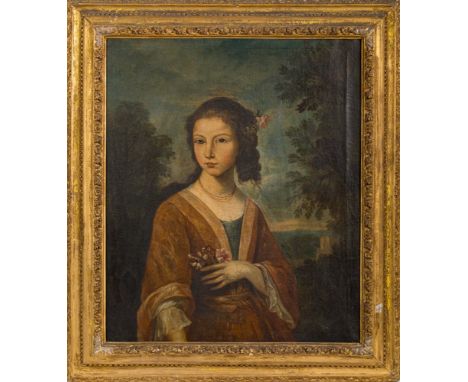 European School late 18th Century-A three-quarter length portrait of a young lady,:-dressed in Oriental silks and holding a p
