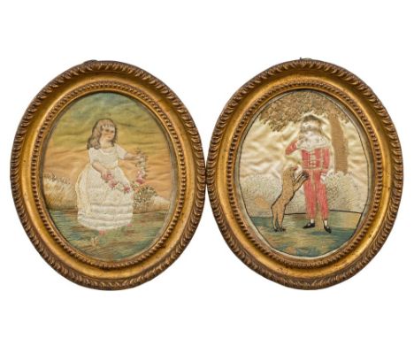 A pair of Regency oval silkwork pictures in original stamped brass frames: depicting a boy playing with a ball and a dog and 