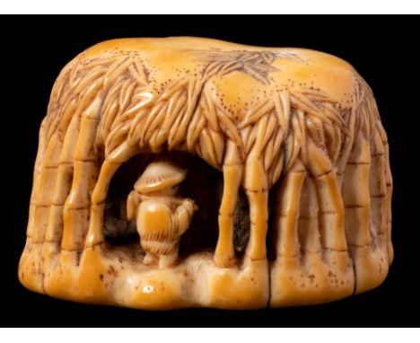 An unusual Japanese carved ivory netsuke: of a bamboo farmer inside a canopy of bamboo branches, Meiji period, 4cm wide.