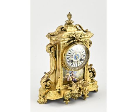 Antique French gilded mantel clock with Sevres porcelain. Composition metal with turtledoves. Circa 1880. Eight-day movement,