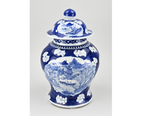 Large 19th century Chinese porcelain lidded vase with mountain landscape/pagoda/floral decor. Equipped with double bottom rin