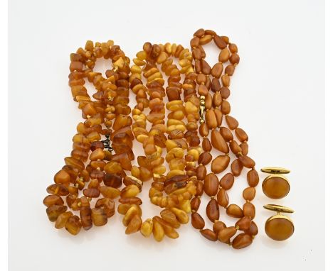 Lot of amber/copal with a pair of cufflinks and 3 strands with amber beads. about 120 grams. In good condition