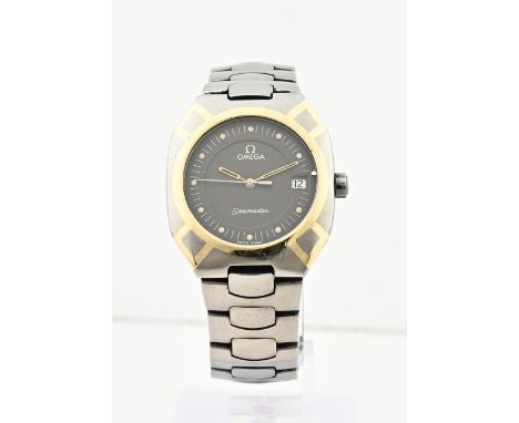 Omega seamaster titan quartz, bicolour. Width 32mm. Equipped with a titanium strap with butterfly clasp. 18.5-19cm. Case back
