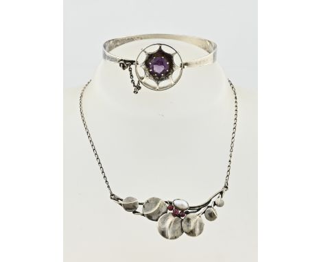 Silver Art Deco bracelet and a silver choker. A silver bangle, 813/000, Art Deco, with open round element set with a purple s