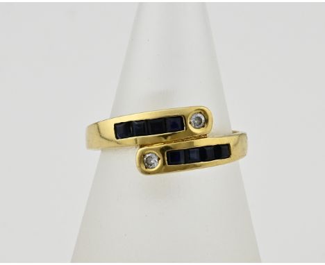 Yellow gold ring, 800/000, with sapphire and zirconia. Ring with a flat band with a stroke set with a rail on both sides with