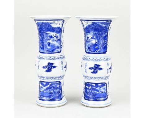 Two blue and white Chinese porcelain vases with landscape/figures/character design. With double blue bottom ring. Size: H 27 
