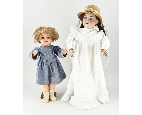 Two antique German dolls. 1x Armand Marseille, porcelain, no. 390/N, articulated body, real hair, cracked head. 1x Heubach Kö