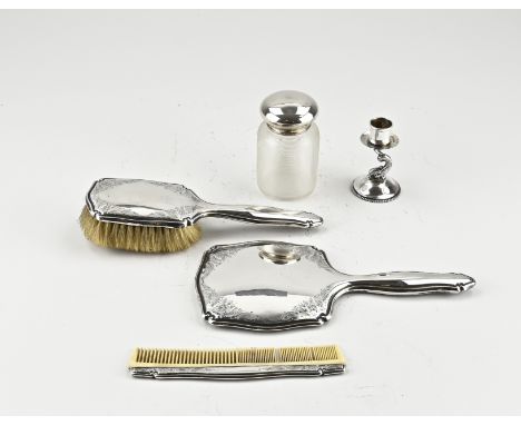 Silver lot, 833/000, with a hairdressing set with a comb, brush and a hand mirror with a contoured frame and engraving, comb 