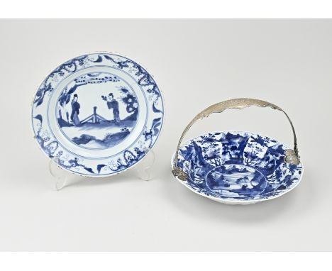 Two 17th - 18th century Chinese porcelain kang xi plates. One bottom mark. 1x Landscape with deity + silver bracket, glued. 1