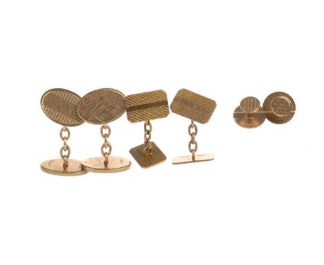 TWO PAIRS OF CUFFLINKS, AND TWO GOLD STUDS  one pair of oval form, the other rectangular, each with engine turned decoration,