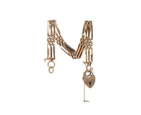 TWO BRACELETS, NINE CARAT GOLD  the gate bracelet in rose gold with padlock clasp, the other in yellow gold Qty: 13.49g gross
