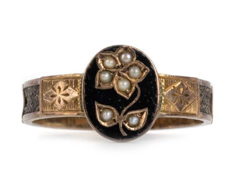 POST VICTORIAN MOURNING RING, the central enamelled panel with seed pearl flower motif, the shank with woven hairwork panels,