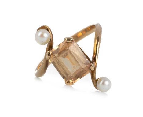 TOPAZ AND SEED PEARL RING, set with a central topaz stone flanked by seed pearls, marked 9CT, size M 1/2Qty: 2.8g