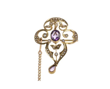 EDWARDIAN AMETHYST AND PEARL HOLBEIN, NINE CARAT GOLD set with an oval and teardrop amethyst, with seed pearls and marked for