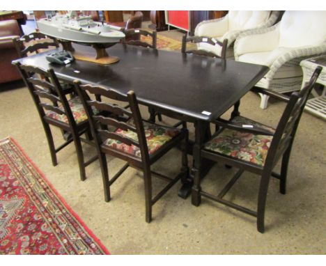 OAK FRAMED RECTANGULAR DINING TABLE WITH A SET OF SIX LADDER BACK DINING CHAIRS COMPRISING FOUR CHAIRS AND TWO CARVERS (7) 