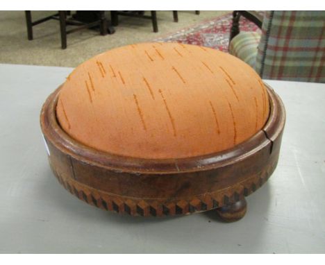 WALNUT CIRCULAR SQUAT STOOL WITH INLAID DETAIL RAISED ON THREE BUN FEET 