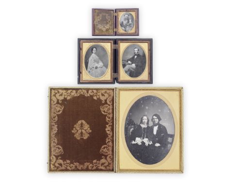 PHOTOGRAPHY - DAGUERREOTYPESA collection of twenty British and American daguerreotype portraits of men, women or couples, inc