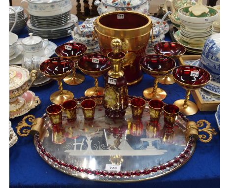 A Murano reverse decorated mirrored tray with twisted clear cased ruby glass cane edge, together with a ruby glass ice bucket