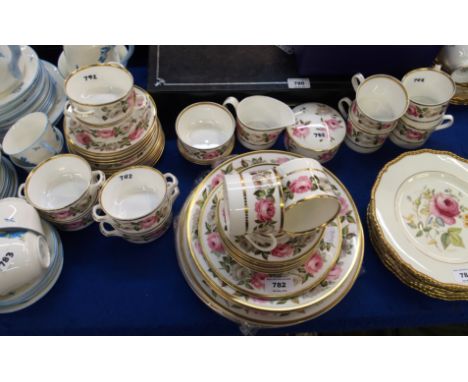 A Royal Worcester Royal Garden dinner service comprising torte plate, six cups, ten saucers, one 20cm plate, two jam dishes, 