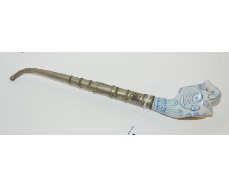 A modern Indian pipe with porcelain bowl modelled as an elephant's head Condition Report: Available upon request