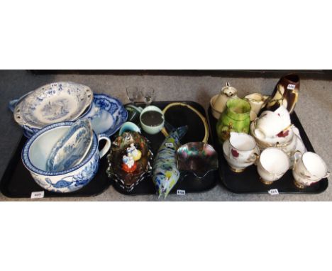 A Spode blue and white dish in the battle between and buffalo and a tiger pattern, a Wedgwood chamber pot decorated with lotu
