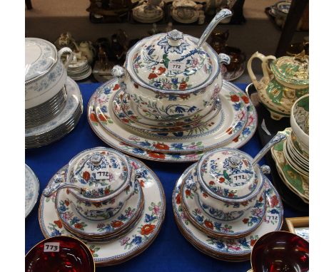 A Booths Green Parrot decorated part dinner service comprising soup tureen and ladle, four graduated platters, two sauce ture